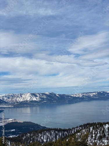 Lake Tahoe with mountain vistas on a blue sky day.