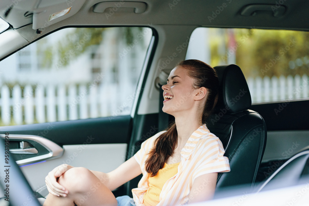 happy woman sitting in car, enjoying the moment, smiling face, sunny day, vibrant attire, comfortable interior, outdoor background, relaxation and freedom concept happy woman sitting in car, enjoying the moment, smiling face, sunny day, vibrant attire, comfortable interior, outdoor background, relaxation and freedom concept
