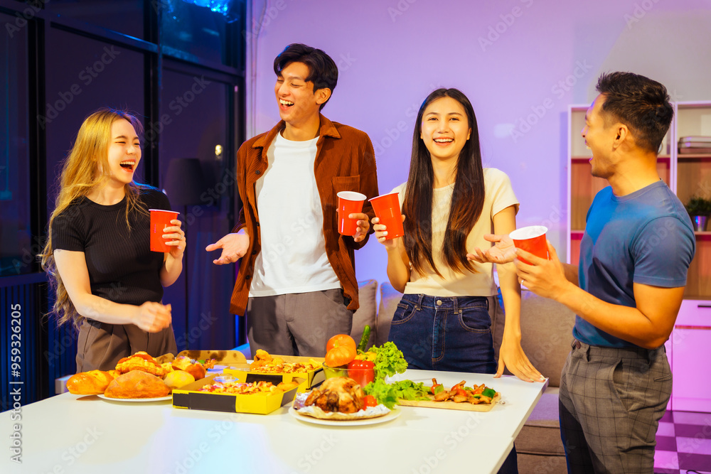 A group of Asian friends gathers in an office for a night of BBQ, pizza, and drinks, celebrating Halloween with vibrant RGB lighting, laughter, and cheering for their favorite soccer team. A group of Asian friends gathers in an office for a night of BBQ, pizza, and drinks, celebrating Halloween with vibrant RGB lighting, laughter, and cheering for their favorite soccer team.