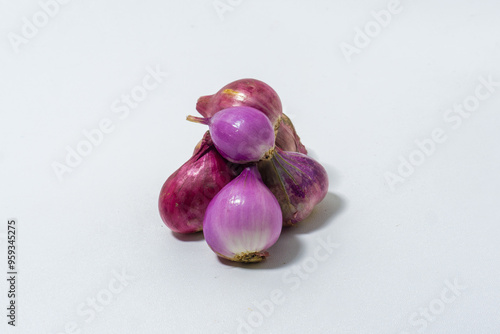 Bawang merah or Small red onion it's vegetables in Asian isolated on white background