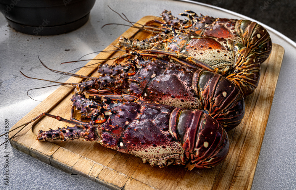 Food themes: Fresh lobsters on kitchen table.