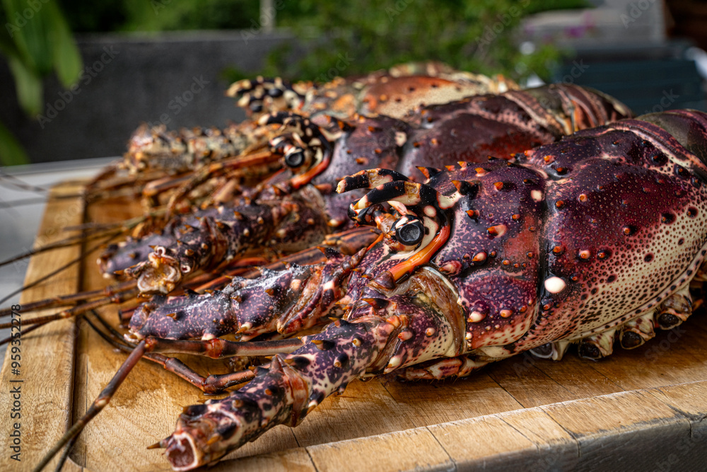 Food themes: Fresh lobsters on kitchen table.