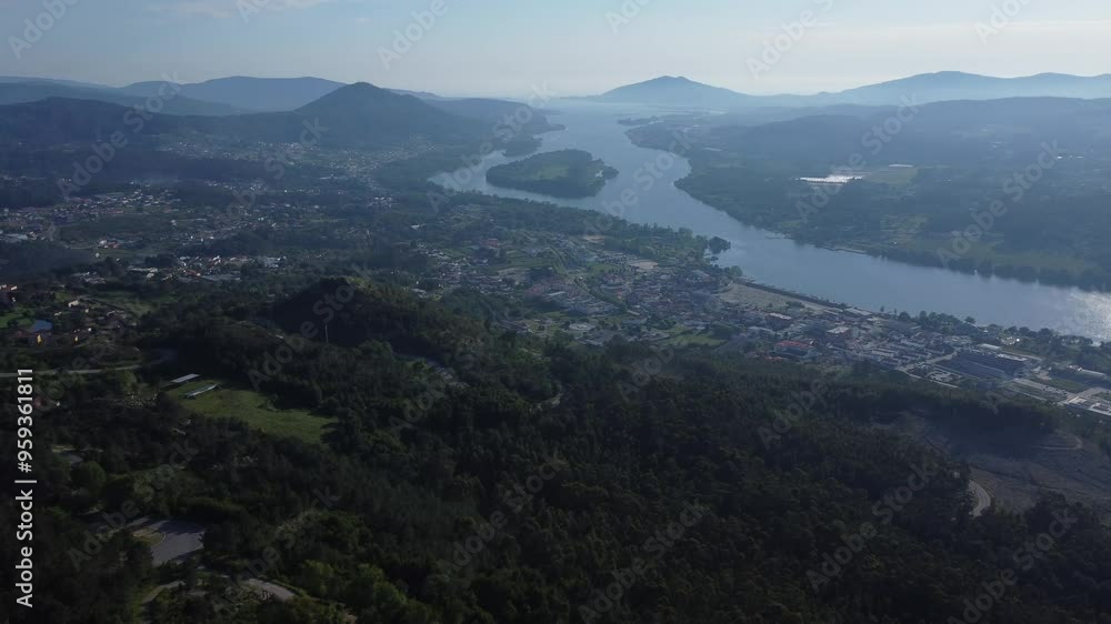 Aerial view of Vila Nova de Cerveira, Portugal. Miradouro do Cervo Viewpoint. Alto Minho, Viana do Castelo in Portugal. On one side of the river is Portugal, on the other is Spain. Aerial view of Vila Nova de Cerveira, Portugal. Miradouro do Cervo Viewpoint. Alto Minho, Viana do Castelo in Portugal. On one side of the river is Portugal, on the other is Spain.