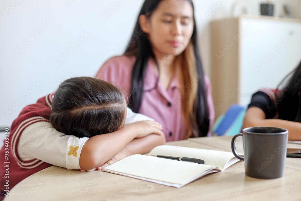 Portrait Of Lazy Little Girl Doing Homework With Writing On Book And Lying On Table Portrait Of Lazy Little Girl Doing Homework With Writing On Book And Lying On Table
