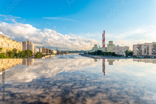 View of Berezhkovskaya Embankment in Moscow with reflection on a mirror stone surface photo