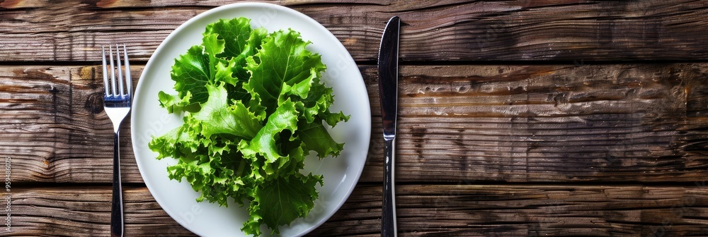 Fresh green lettuce leaves on a white plate showcasing a nutritious food choice Fresh green lettuce leaves on a white plate showcasing a nutritious food choice