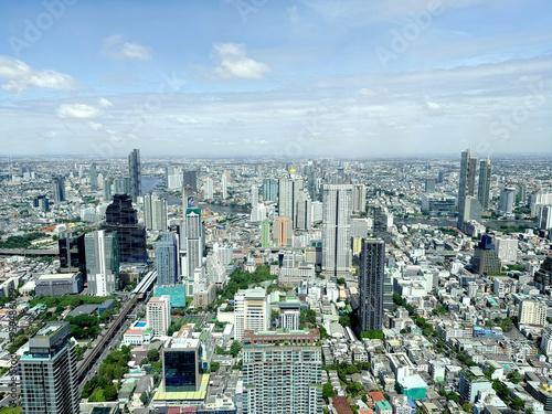 Photography Aerial view of Bangkok skyline, Bangkok financial district, buildings and skyscrapers under sunny sky