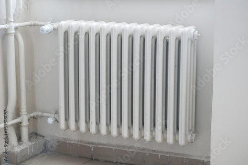Wallpaper Mural White radiator on grey white wall. apartment heating installation system,  Torontodigital.ca