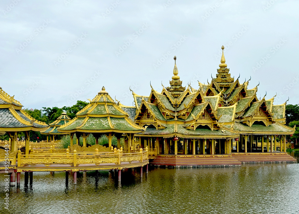 Amazing famous Pavilion of the Enlightened, a green temple complex in Muang boran Ancient city, Samut Prakan, Bangkok, Thailand. Surrounded by a lake. Amazing famous Pavilion of the Enlightened, a green temple complex in Muang boran Ancient city, Samut Prakan, Bangkok, Thailand. Surrounded by a lake.