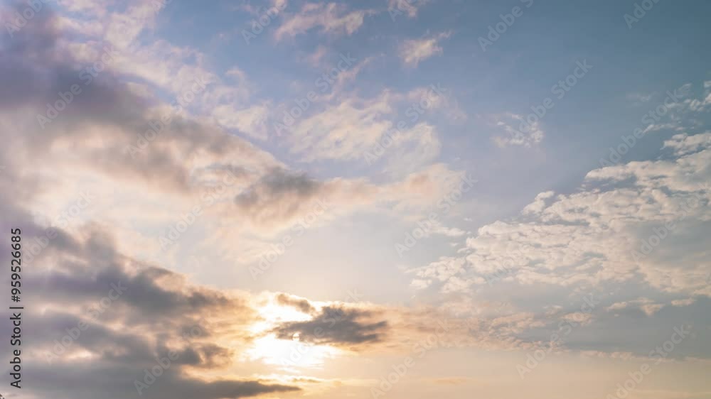 Beautiful morning sky. Sun rays emerge through the clouds at sunrise. Beautiful morning sky. Sun rays emerge through the clouds at sunrise.