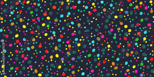 Colorful confetti scattered on a dark background