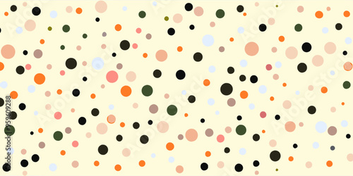 A pattern of multicolored dots scattered across a light background