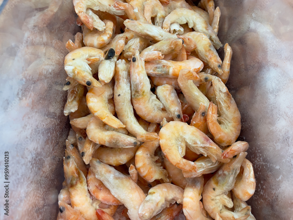 Frozen shrimp at the market. Seafood in the background. Frozen shrimp at the market. Seafood in the background.