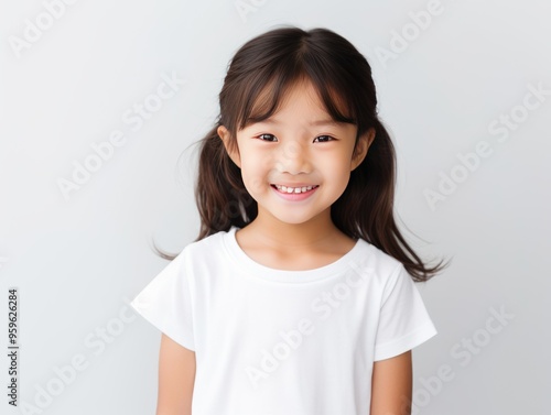 White background Happy Asian child Portrait of young beautiful Smiling child good mood Isolated on backdrop ethnic diversity equality acceptance concept