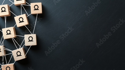 Connecting Wooden Blocks with Strings to Illustrate Network or Relationship Concepts photo