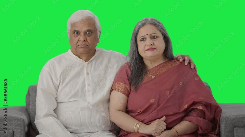Angry Indian Old couple looking at the camera Green screen Angry Indian Old couple looking at the camera Green screen