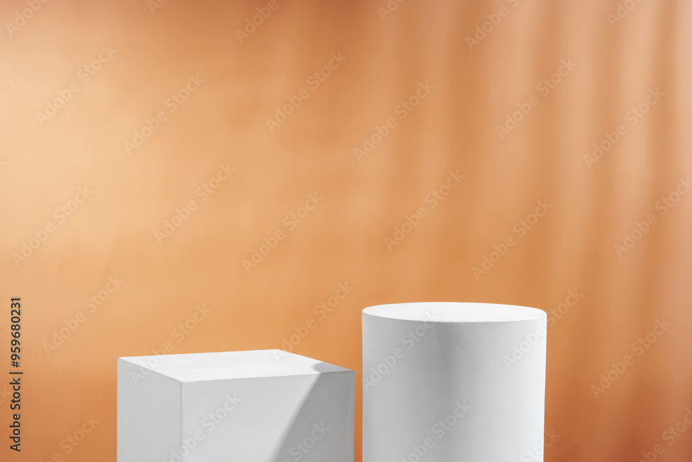 Various geometric shapes arranged artistically on a table with a warm, soft background during daylight Various geometric shapes arranged artistically on a table with a warm, soft background during daylight