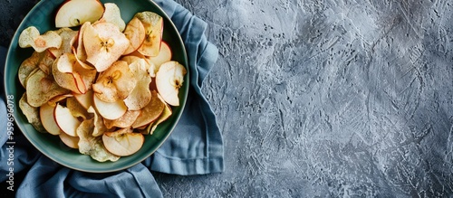 Healthy apple chips on a ro...