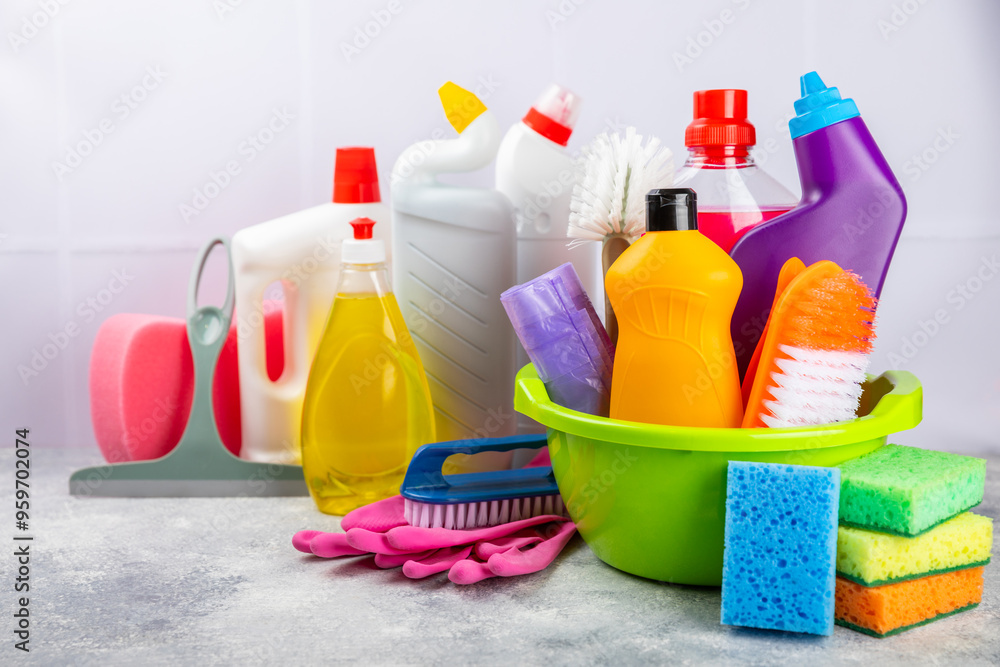 Cleaning service concept.Home cleaning product on a pink background. Bucket with household chemicals. cleaning supplies for home or office space.Early spring regular cleaning. Copy space Cleaning service concept.Home cleaning product on a pink background. Bucket with household chemicals. cleaning supplies for home or office space.Early spring regular cleaning. Copy space