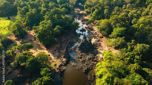 Aerial perspective of Phnom Kulen National Park, with its carved riverbed and scattered ancient statues.