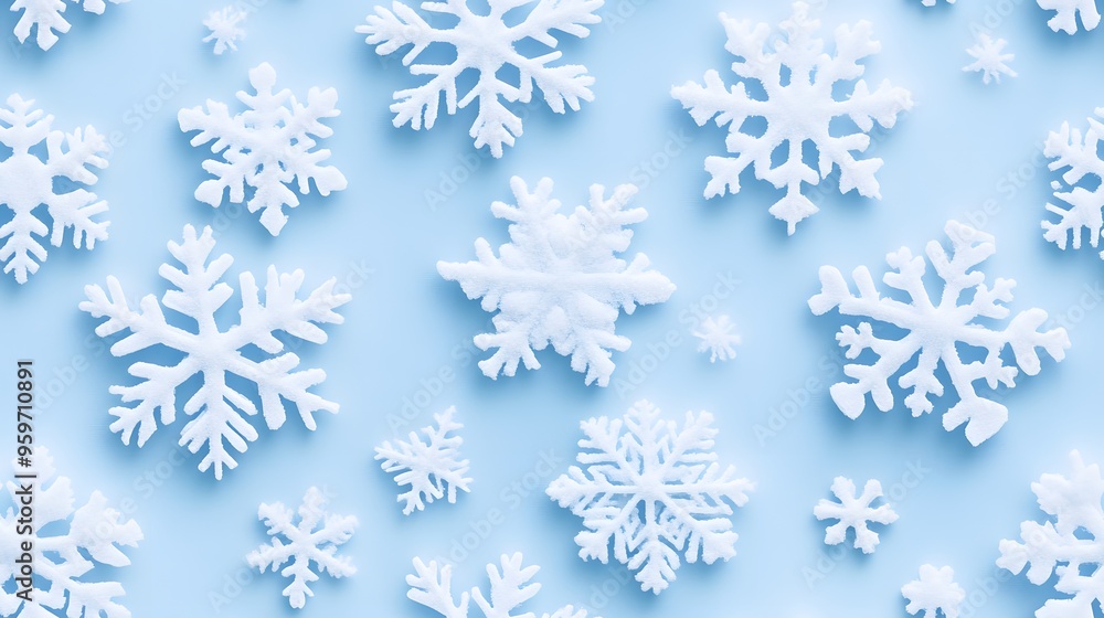 A clean and attractive background featuring an assortment of white snowflakes on a light blue surface, perfect for winter-themed designs. A clean and attractive background featuring an assortment of white snowflakes on a light blue surface, perfect for winter-themed designs.