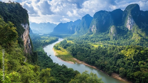 Top view of the towering limestone cliffs of Nong Khiaw, with the Nam Ou River winding through the verdant valley. photo