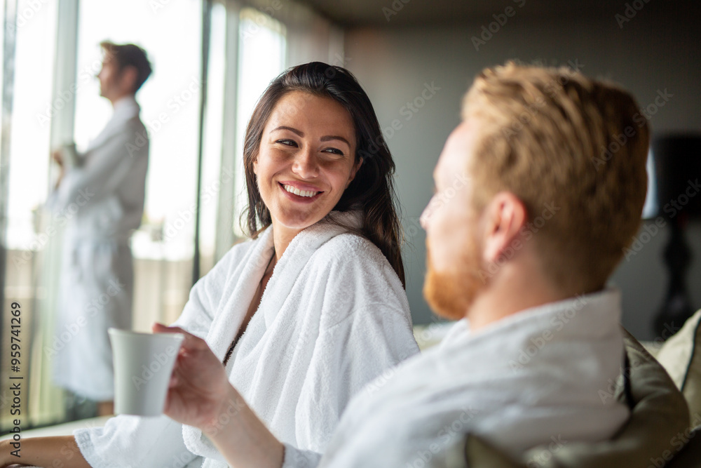Beautiful young couple enjoying and relaxing in SPA center. People enjoying weekend, holiday Beautiful young couple enjoying and relaxing in SPA center. People enjoying weekend, holiday