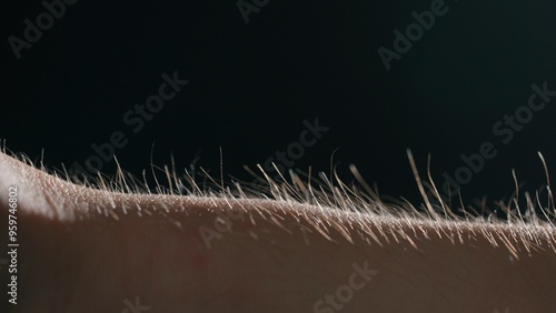 Macro shot of Hair Standing on End Against a Dark Background