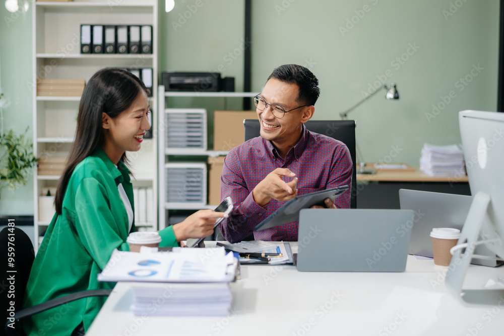 Obraz premium Business teamwork and collaboration among Asian professionals in a modern office