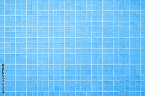 Blue light ceramic wall chequered and floor tiles mosaic background in bathroom. Design pattern geometric with grid wallpaper texture decoration pool. Simple seamless abstract surface clean.