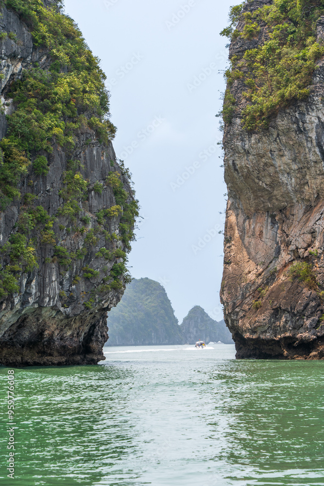 Fototapeta premium Small passage between two islets in Ha Long Bay, Quang Ninh, Vietnam