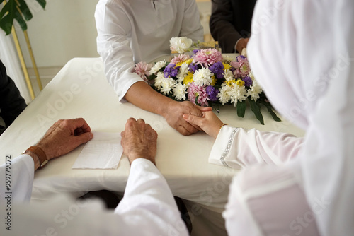 Shaking Hands In An Islamic Prenuptial Agreement. Indonesian’s Wedding, Akad Nikah photo