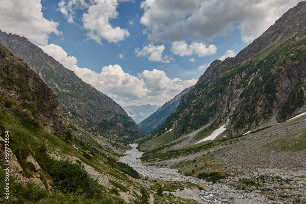 Beautiful views of the mountains and the glacial cirque on the route to the Refuge des Bans, in the Écrins National Park. Alps. France Beautiful views of the mountains and the glacial cirque on the route to the Refuge des Bans, in the Écrins National Park. Alps. France