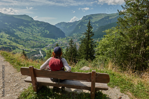 Hiking to the Gletscherschlucht glacier in Grindelwald, with imposing canyons, waterfalls and panoramic views of the valley. Swiss Alps