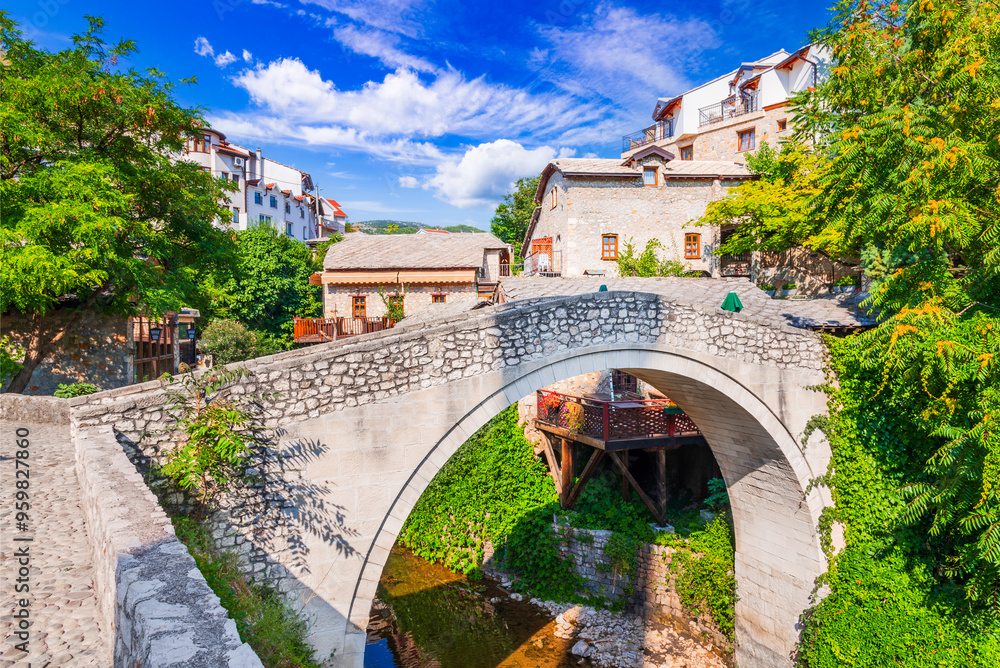 Mostar, Bosnia. Old town street and bridge, Bosnia and Herzegovina. Balkan Peninsula travel destination.