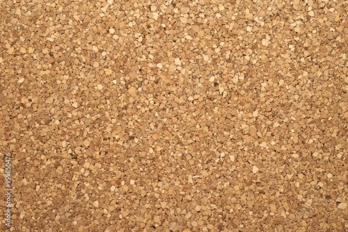 A detailed close up texture of natural cork board, perfect for various background design uses