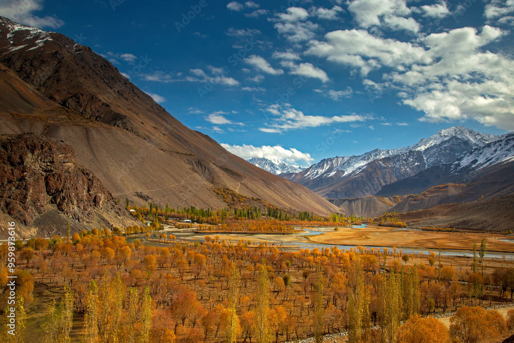 View of serene Phander Valley with majestic mountains and a tranquil river, Ghizer District, Pakistan. View of serene Phander Valley with majestic mountains and a tranquil river, Ghizer District, Pakistan.