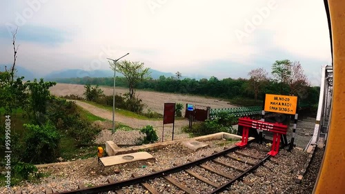 POV of Scenic Mountain River from Train in Dooars, West Bengal photo