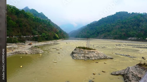 POV of Scenic Mountain River from Train in Dooars, West Bengal photo