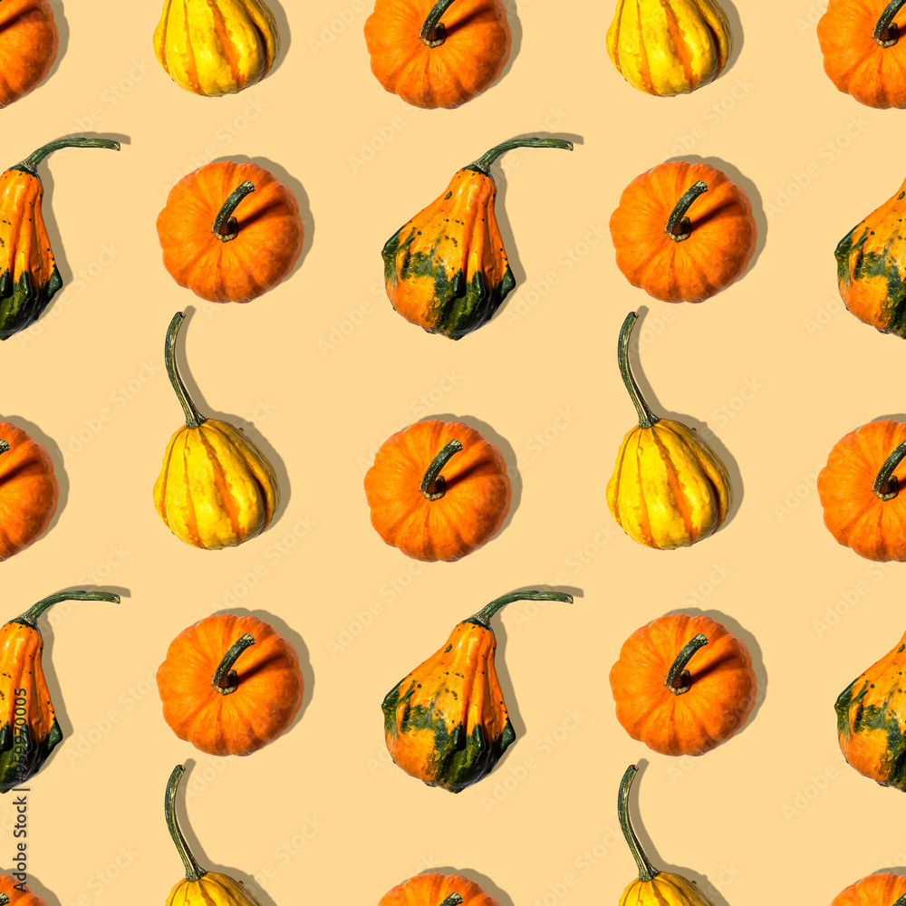 seamless pattern different pumpkins on a orange background seamless pattern different pumpkins on a orange background