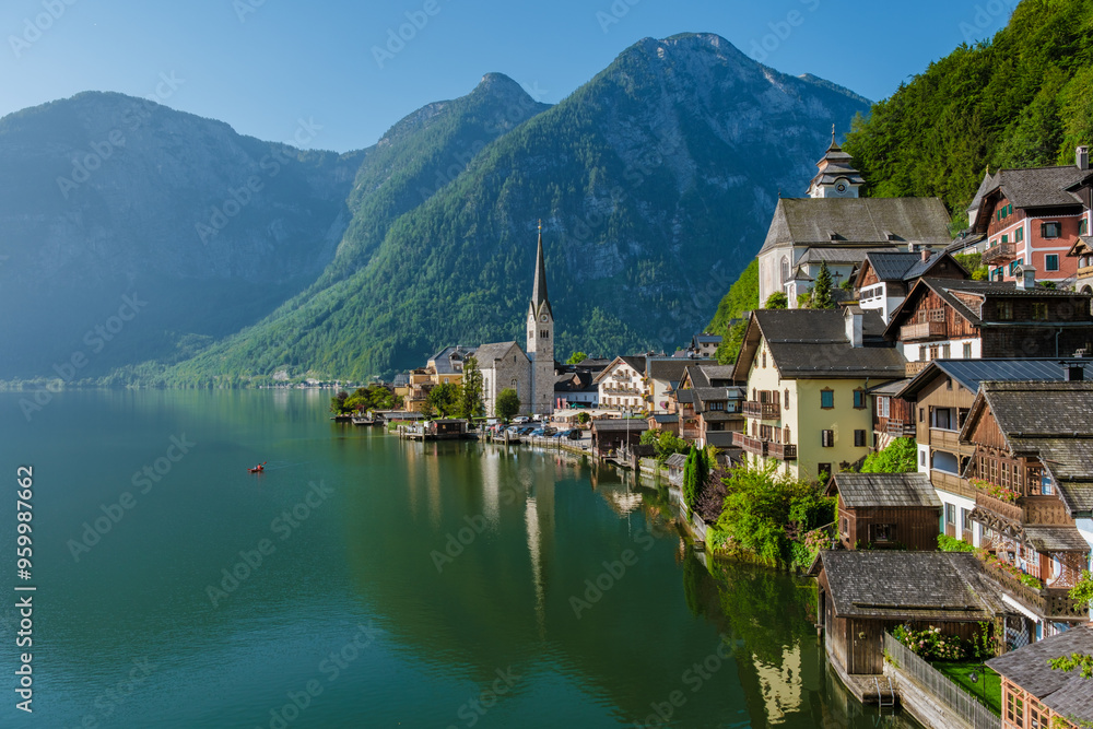 Fototapeta premium Tranquil morning in Hallstatt, Austria showcasing the serene beauty of lakeside architecture