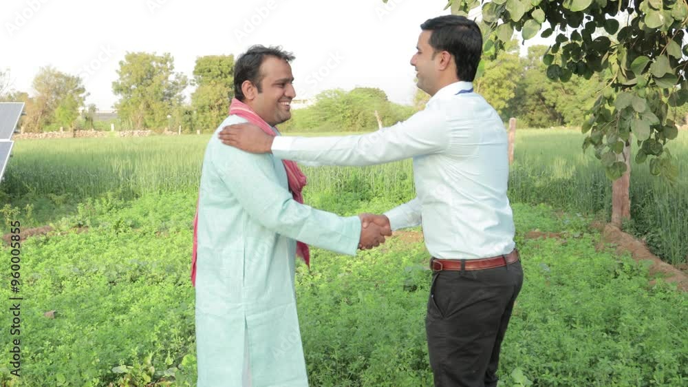 Young indian banker or bank person shake hand with farmer at agriculture field. People India. Appreciate Young indian banker or bank person shake hand with farmer at agriculture field. People India. Appreciate