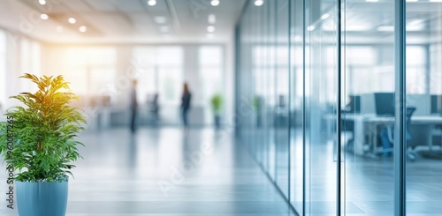 Wallpaper Mural Blurred office background with glass door and people working in the distance, light blue color theme, white lighting Torontodigital.ca
