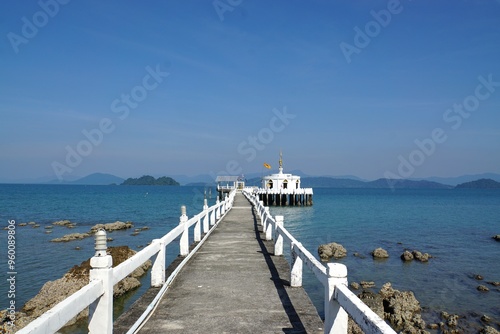 Bridge to the church in the sea at Payam Island, Thailand, Thai temple  photo