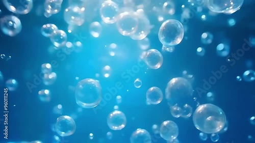 Wallpaper Mural Footage of ethereal bubbles rising through clear, deep blue water, creating a mesmerizing and calming visual.
 Torontodigital.ca