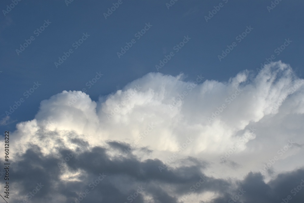 white and dark rain cloud floating on sky in evening white and dark rain cloud floating on sky in evening