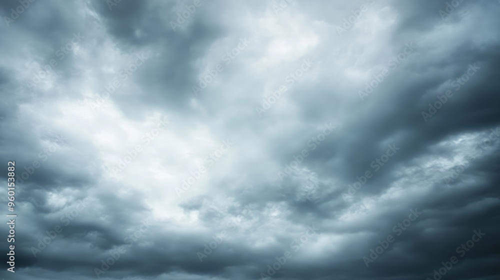 Gray clouded sky, evoking a moody and introspective atmosphere. Gray clouded sky, evoking a moody and introspective atmosphere.