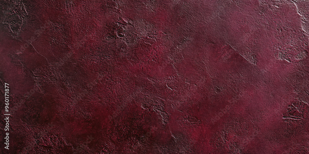 Fototapeta premium A rich burgundy red textured stone surface with a matte, slightly uneven finish. The deep color and texture add a sophisticated, dramatic quality.
