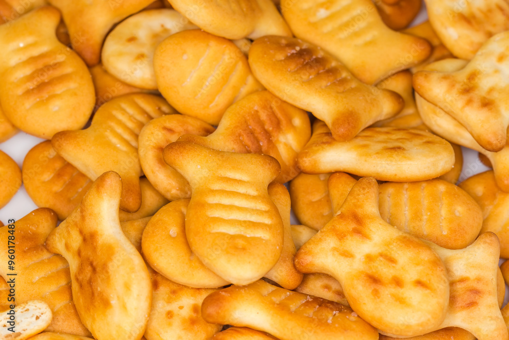 Salty crackers in form of small fishes, close-up Salty crackers in form of small fishes, close-up