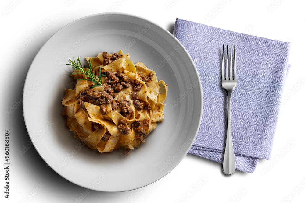 White bowl with pappardelle with wild boar ragout sauce White bowl with pappardelle with wild boar ragout sauce